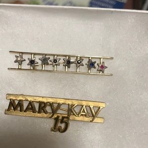 Vintage Mary Kay pins.